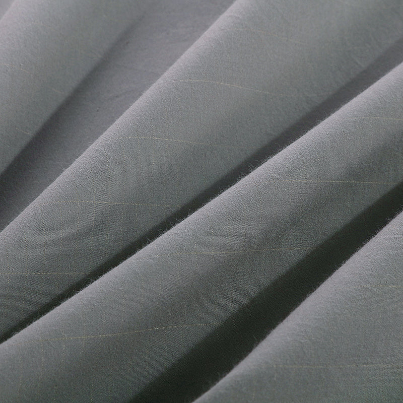 close up of gray grounding half bed sheet